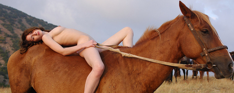 Dariya naked on horseback
