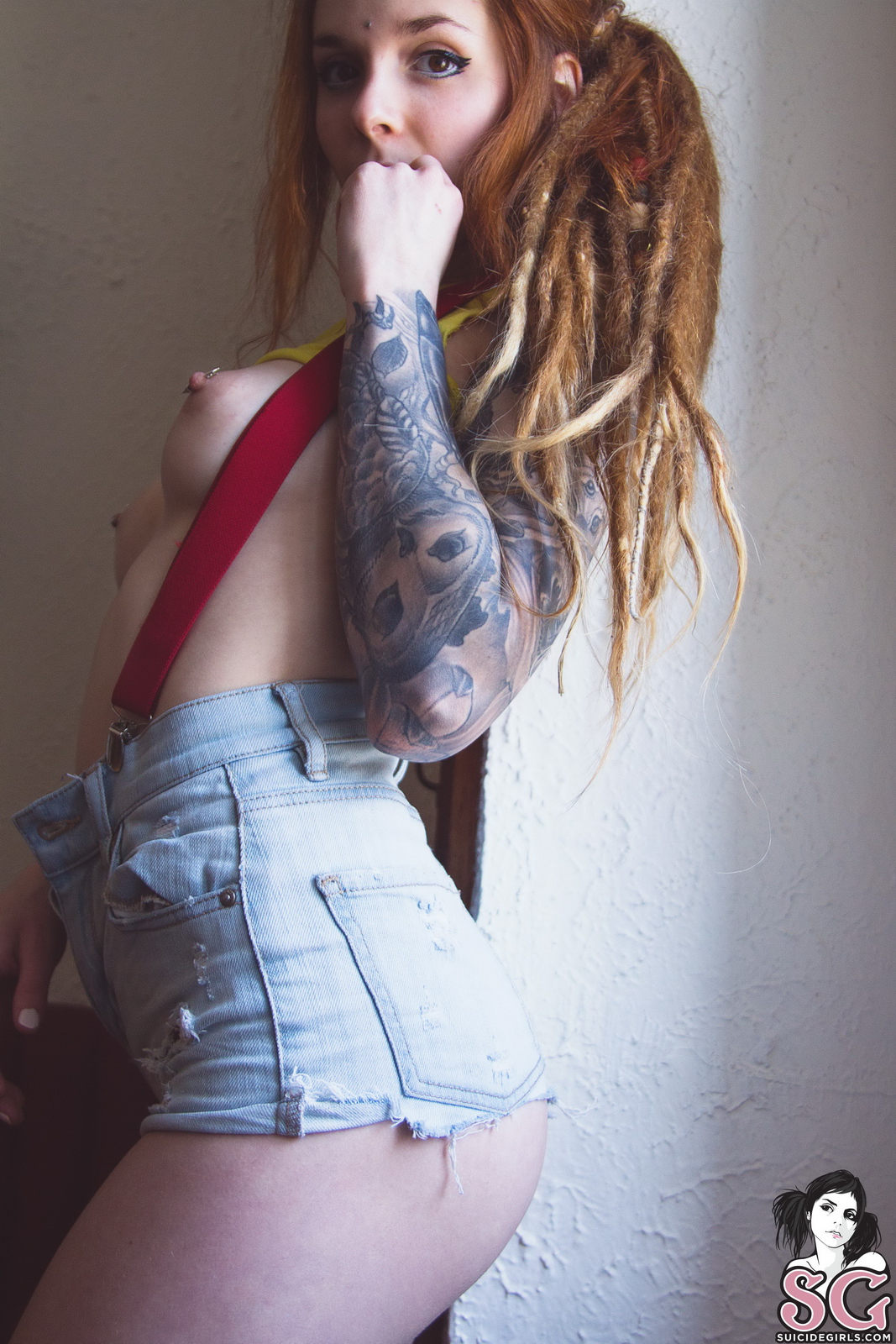 fennek-redhead-dreadlocks-tattoos-naked-suicidegirls-15