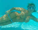 Amber Lynn Bach dives in pool