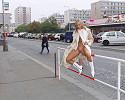 Blond girl taking a walk in fur coat