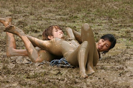 Girls having fun in mud